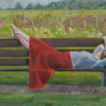 Self portrait lying on bench