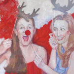 Two girls with antlers